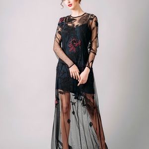 French connection gown; black embroidered sheer overlay with navy slip. Size 6